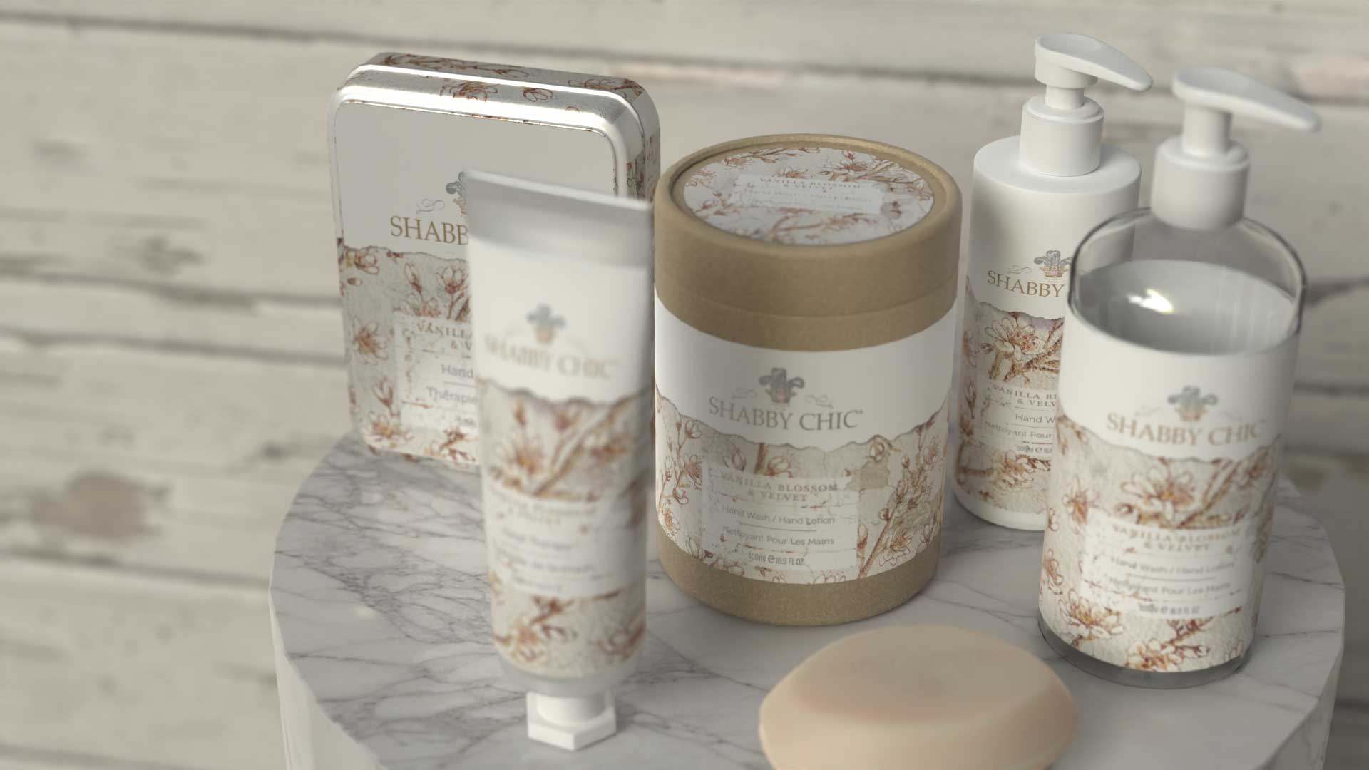 Vanilla Blossom & Velvet range styled on marble — kraft tube, tin and pumps
